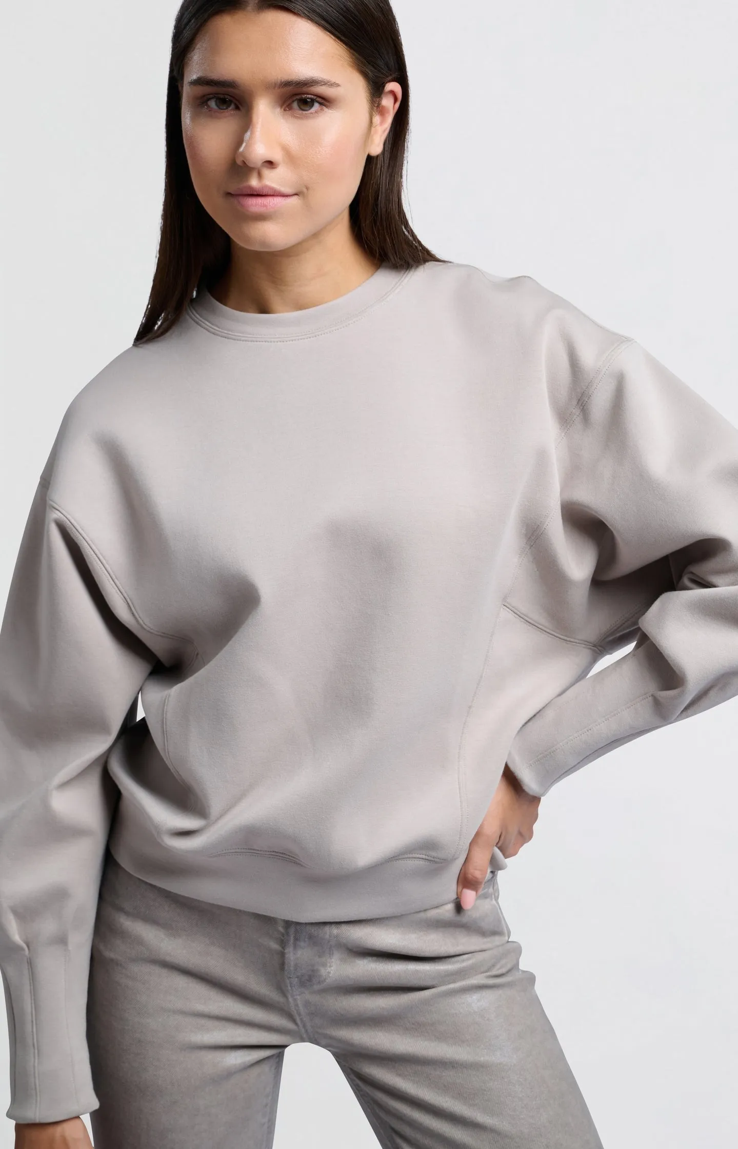 Beige sweatshirt with pleated detail on long sleeves