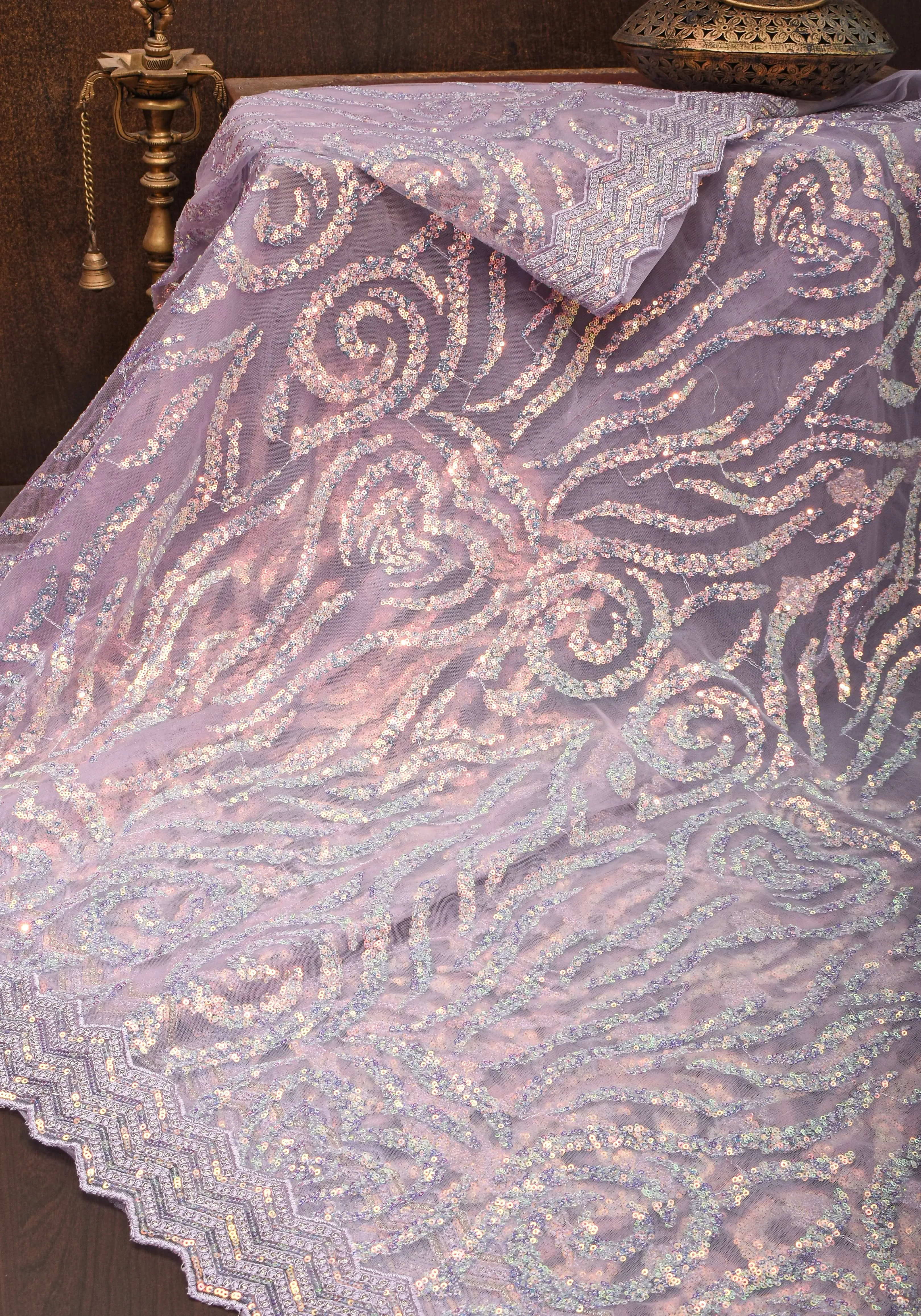 Swirls Design Dusty Pastel lavender Net Saree with sequins